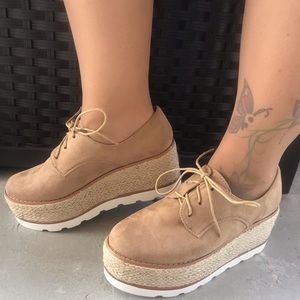 Pazzle platform shoes.